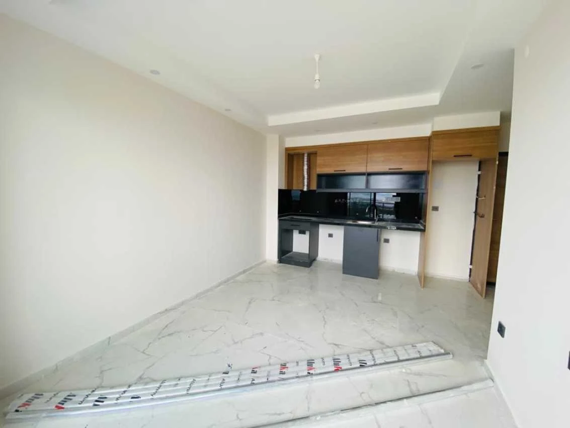 housebind Квартира планировки 1+1 в современном комплексе в Махмутларе /Алания