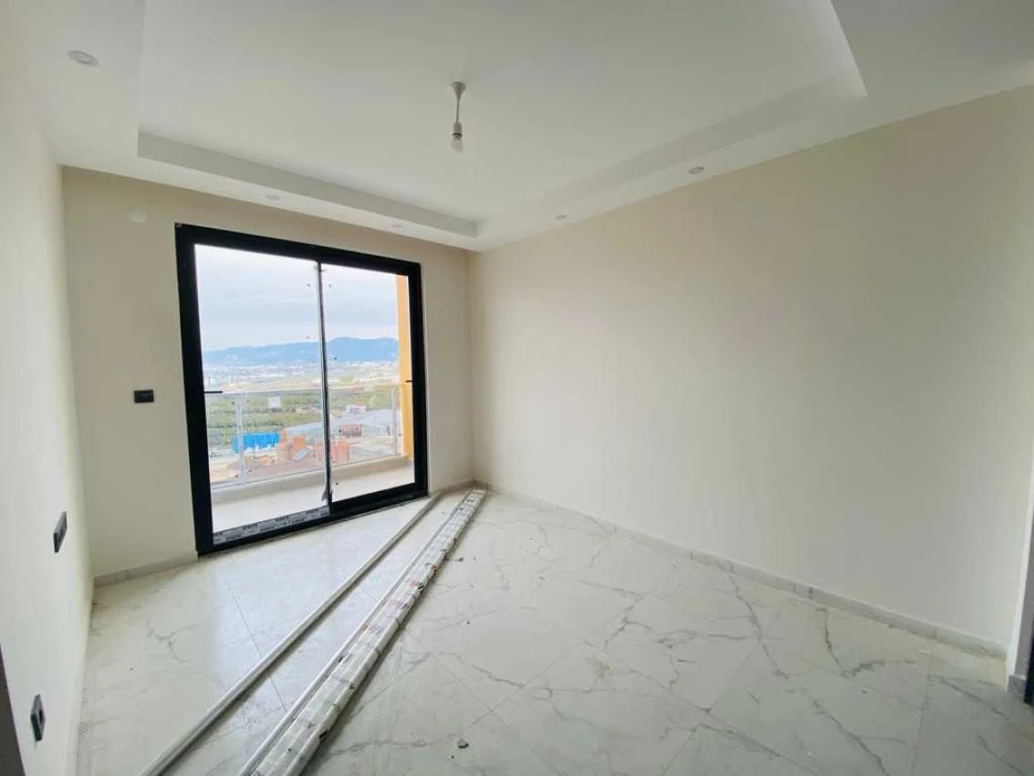 housebind Квартира планировки 1+1 в современном комплексе в Махмутларе /Алания