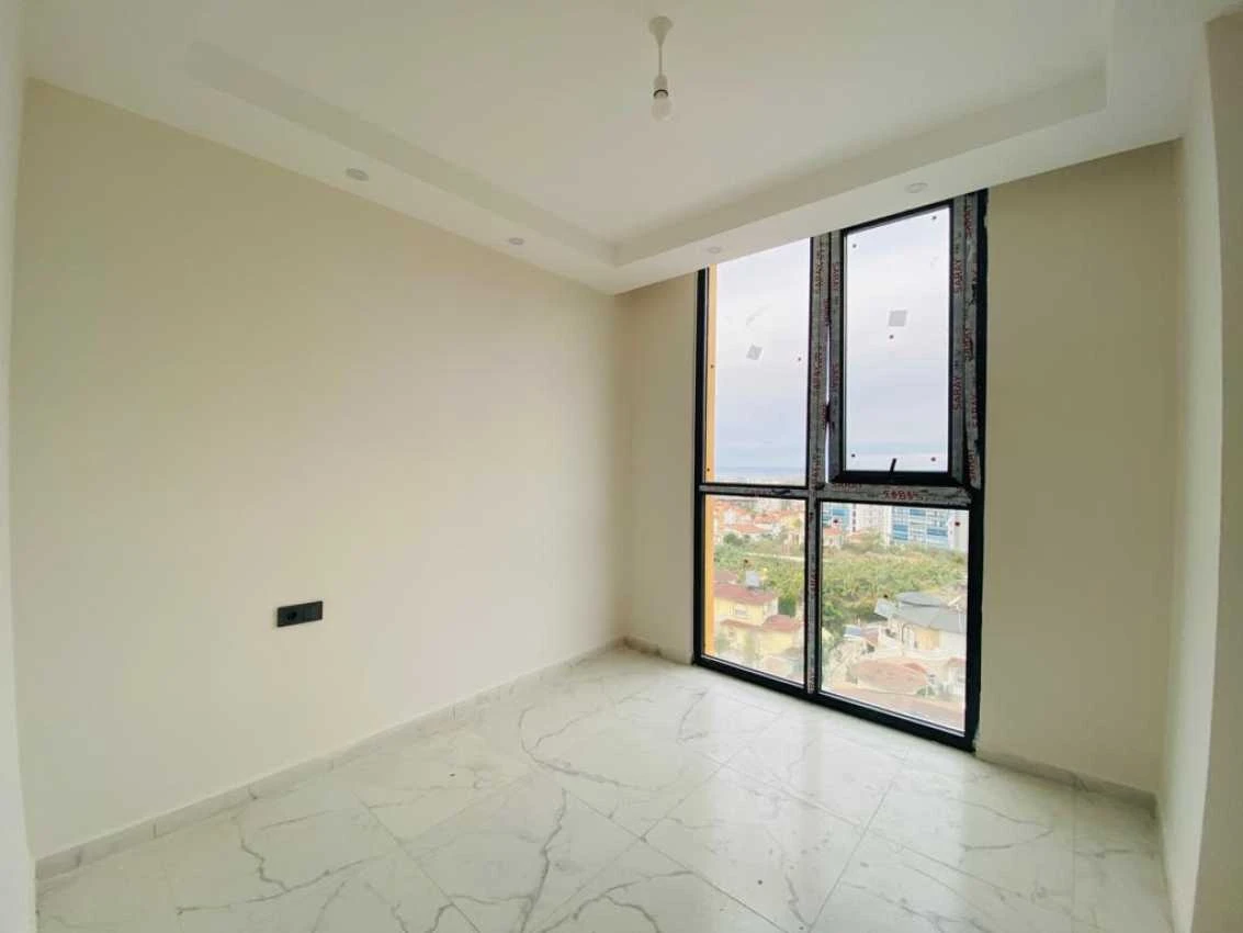 housebind Квартира планировки 1+1 в современном комплексе в Махмутларе /Алания