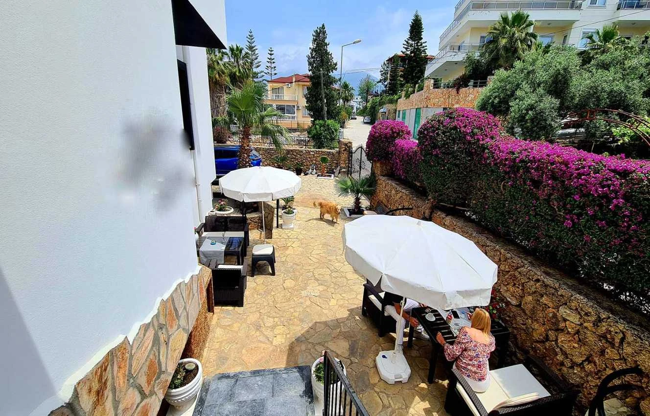 housebind Представляем виллу с тремя квартирами 3 + 1 в Кестель/Аланья