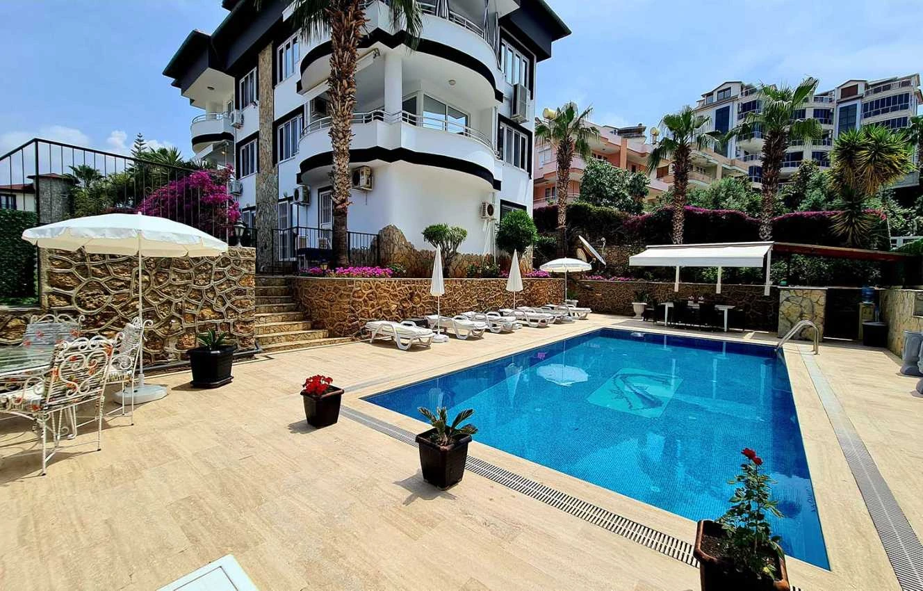 housebind Представляем виллу с тремя квартирами 3 + 1 в Кестель/Аланья